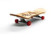 Street x Caramel Monster 36mm complete fingerboard with natural wood deck, red wheels, and black trucks.