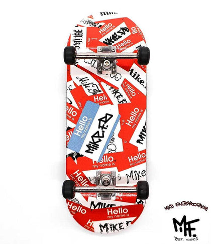 34mm Mike FB x Caramel Hello complete fingerboard with red and white "Hello my name is Mike" graphic.