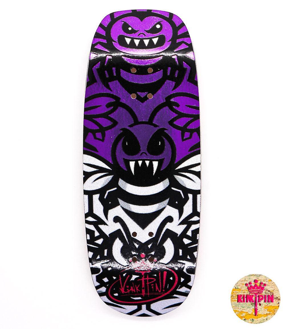 Kinkpin Killer Bees 34mm fingerboard deck with purple, black, and white bee graphic on purple wood.