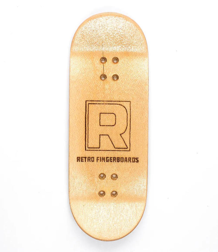 Natural maple wood fingerboard deck with "R RETRO FINGERBOARDS" logo, high kicks, and grip tape.