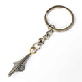 Fingerboard Keychain – Miniature Fingerboard Truck Keyring for Fans of Caramel Trucks
